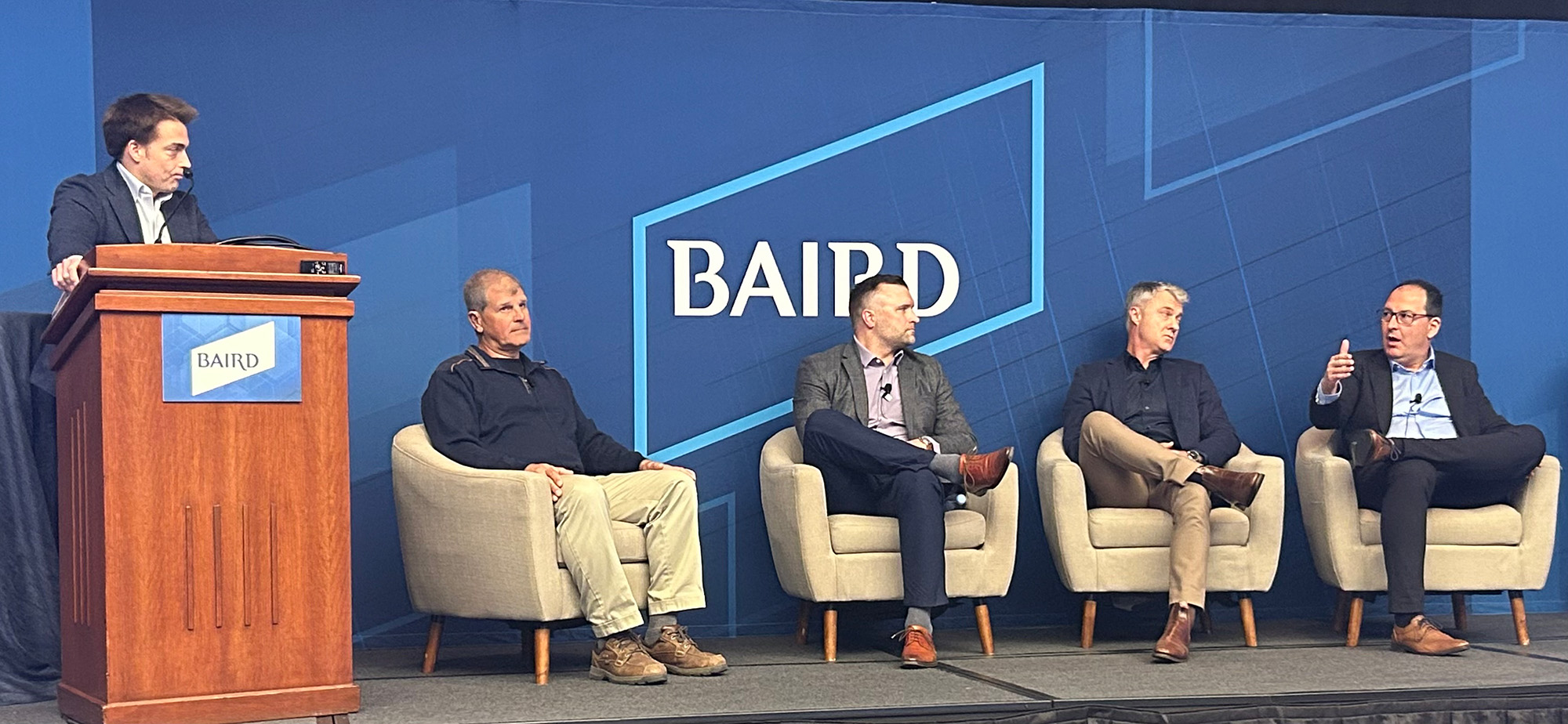 Joe Vruwink moderates a panel discussion with James Balzary, Joe Bellini, Stefan Jesse, and Josh Roberts at Nexus's Annual Global Industrial Conference
