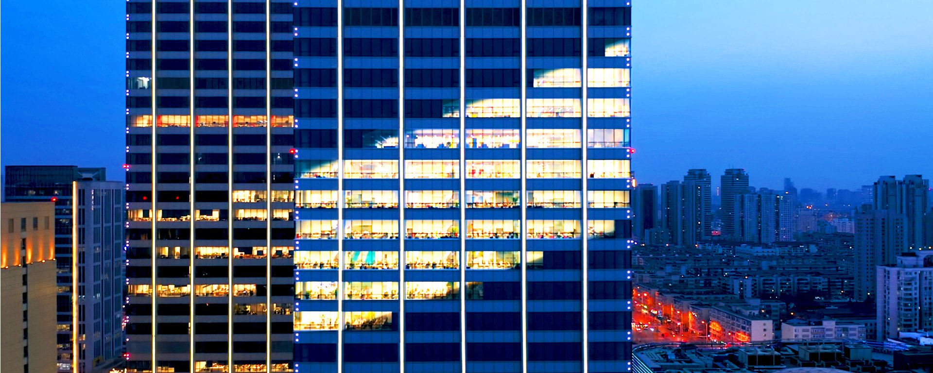Building with lights in the shape of the Nexus logo.